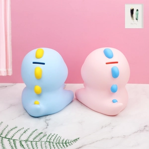 Tirelires dinosaures mignons en bleu et rose, idée cadeau créative pour enfants