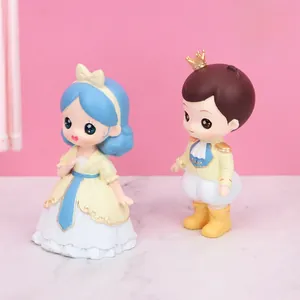 Detail of Nordic prince and princess figurines with elegant costumes for home decor