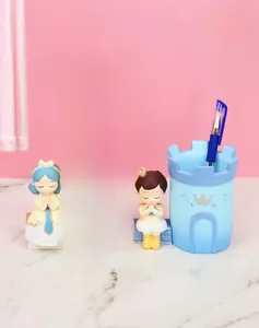 Castle shaped desk organizer for pens and makeup brushes with cute resin doll figures