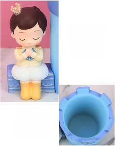Macro detail of cartoon prince holder with crown and polished blue interior storage
