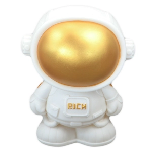 White and gold astronaut piggy bank with RICH lettering and gold visor mirror finish