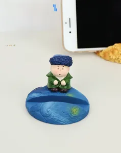 Detail of Van Gogh resin phone stand with Starry Night base and cute artist figure