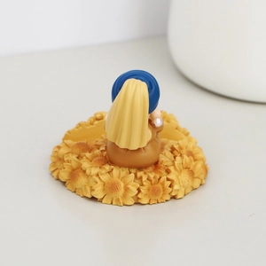 Artistic Girl with a Pearl Earring phone stand featuring detailed sunflower base