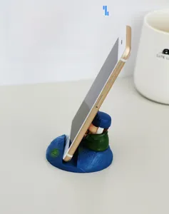 Artist style phone stand with Van Gogh starry night pattern holding a smartphone