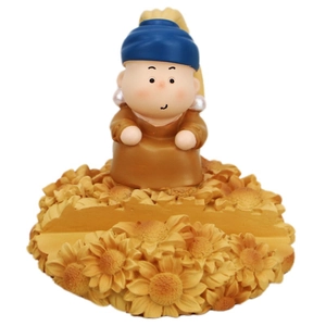 Creative resin phone holder inspired by Girl with a Pearl Earring on sunflowers base