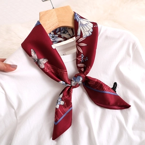 Elegant burgundy floral satin square scarf with butterfly pattern on white shirt