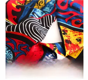 Detail shot of invisible stitching and abstract geometric patterns on silk scarf fabric