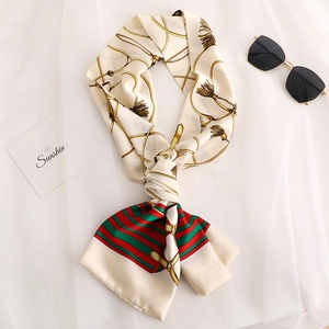 Elegant off-white long silk scarf with golden chain patterns and red-green stripes