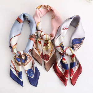Three elegant vintage square silk scarves with horse harness and chain prints on white background