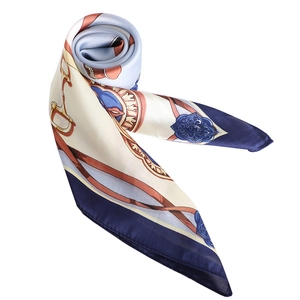 Elegant silk scarf with vintage equestrian horse bit patterns in navy and tan colors
