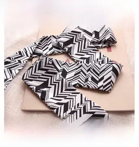 Detail of retro zebra pattern scarf with premium invisible inner stitching craftsmanship