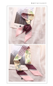 Close-up of elegant floral twilly scarf with polka dots and geometric patterns