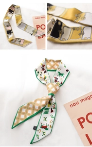 Detail of silk-feel twilly scarves featuring retro chain and equestrian horse prints