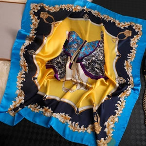 Detailed view of silk square scarf with baroque horse pattern and vibrant satin finish