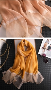 Detail of champagne and mustard yellow silk scarf with gold pearl beading edge