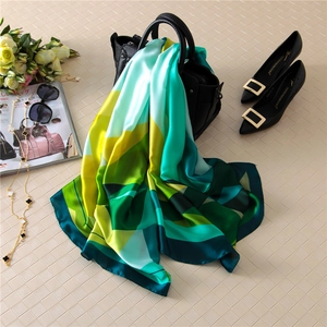 Chic geometric silk scarf in yellow and green blocks with premium glossy finish for women