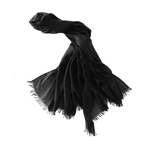 Solid black linen-cotton blend long scarf with natural frayed edges and minimalist style