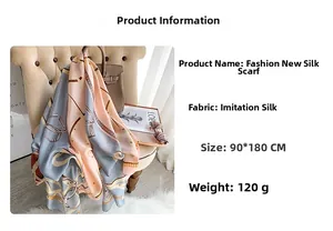 Close-up of lightweight long fashion scarf with chain print and silk texture