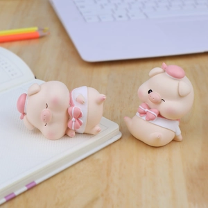 Cute pink resin pig figurines for car and desk decor, featuring sleeping and sitting poses