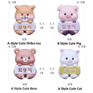 Detailed dimensions of cartoon animal figurines showing 6.1cm height and 5cm width