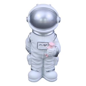 Creative astronaut resin figurine in white and silver holding a pink rose for desk decor