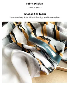 Detailed fabric display of elegant faux silk scarf featuring abstract ink print pattern
