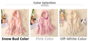 Detail showing elegant calla lily print scarves in pink and cream lightweight fabric