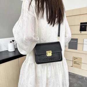 Chic black crossbody square bag with faux crocodile texture and gold hardware details