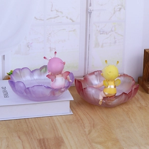 Creative flower-shaped snack tray with fairy figurine ornaments for home table decor