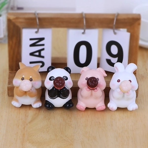 Set of 4 cute cartoon animal resin figurines holding donuts for car and desk decor