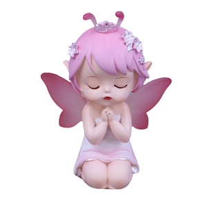Cute pink fairy girl desk ornament with wings and crown in a creative prayer pose