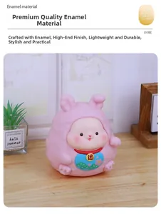 Close-up of pink rabbit bank made of high-quality vinyl on a wooden table setup