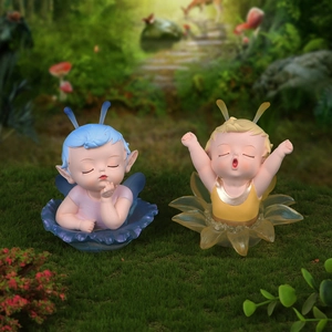Secret Flower Fairy blind box figurines with blue and yellow elf on floral bases