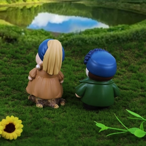 DIY art figurine set featuring Van Gogh and Girl with a Pearl Earring on grass
