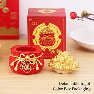 Creative red money bag ornament with golden ingots and matching gift box packaging