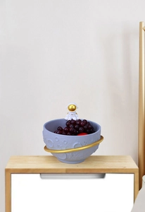 Macro detail of astronaut blue moon bowl with crater texture for fruit storage