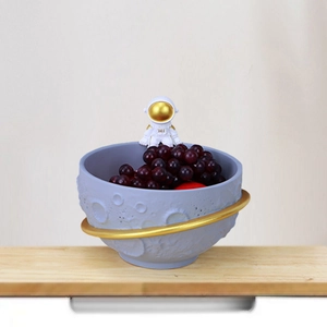Astronaut fruit bowl with moon texture and golden ring decoration for home decor
