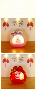 Detail view of rabbit night light with internal figurine and warm LED glow lighting