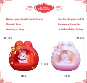 Detail view of rabbit night light showing 10.3cm height and resin material specs