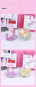 Close-up of cute cartoon flower fairy night light ornaments with fairy wings in a lotus base