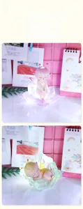 Detailed view of glowing cartoon flower fairy night lights in pink and green themes