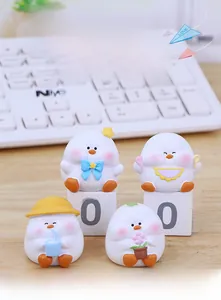 Set of four cute resin white duck figurines with accessories for desk and car decor