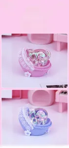 Macro shot of cute pig night light in lace crib base with warm pink and blue soft lighting