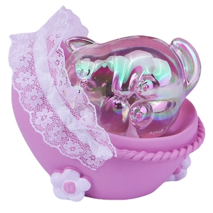 Cute pet night light with iridescent glass finish in a pink lace cradle display