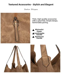 Close-up of metal zipper and reinforced stitching on a vintage brown tote bag handle