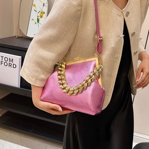 Metallic pink faux leather handbag with gold chain handle and glossy textured finish