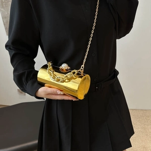 Goldene zylindrische Abendtasche aus Acryl mit Perlenverschluss und Metallgriff