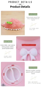 Detail showing pink strawberry piggy bank with removable plush hat and battery base