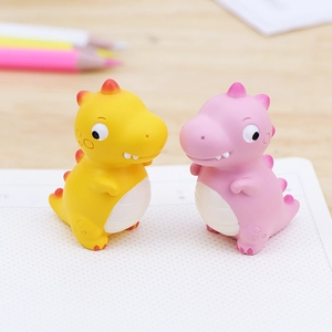 Süße kleine Dinosaurier-Figuren in Rosa und Gelb für Schreibtisch und Auto-Deko
