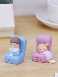 Cute resin couple figurines sitting on mini sofas for office and car interior decor
